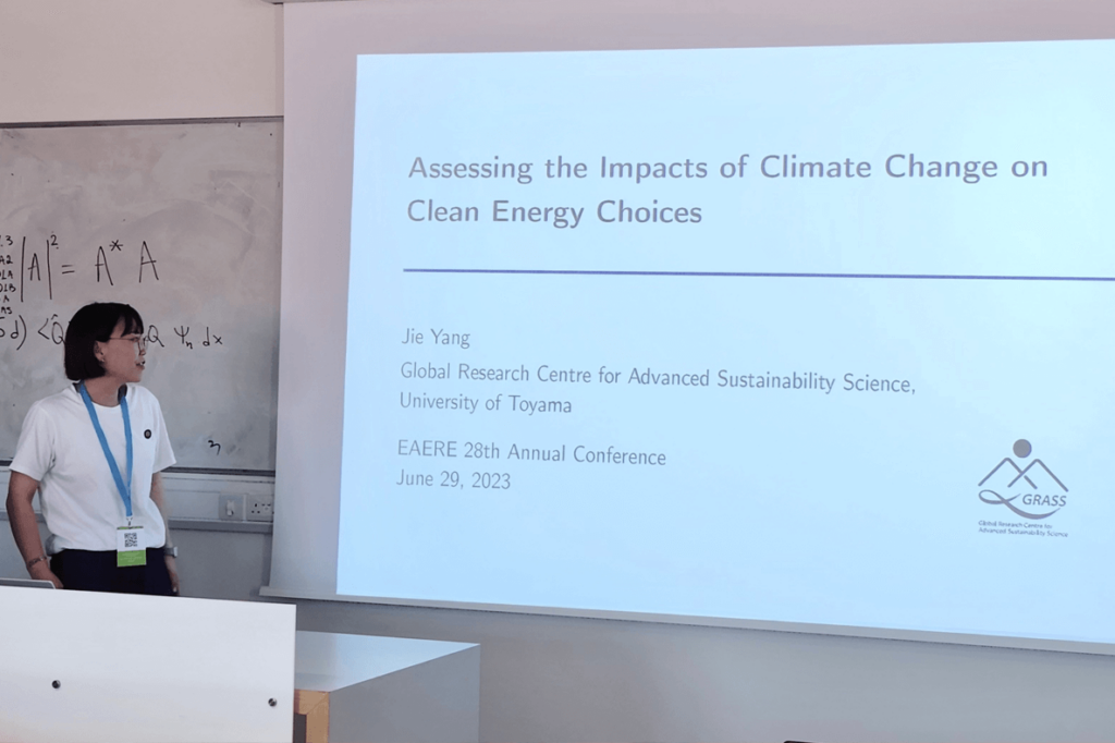 Yang at a presentation, showing her passion for environmental research