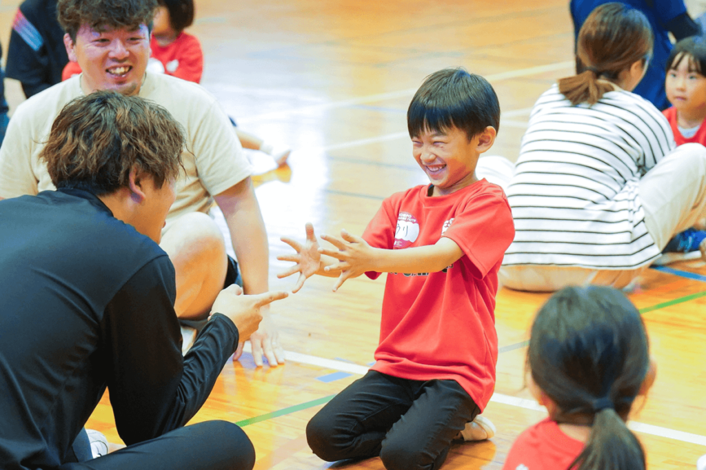 Pro athletes and kids enjoying the joy of sports